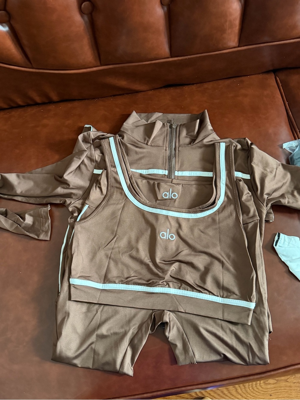 ALO Yoga Kids Brown Rashguard Set with Light Blue Trim